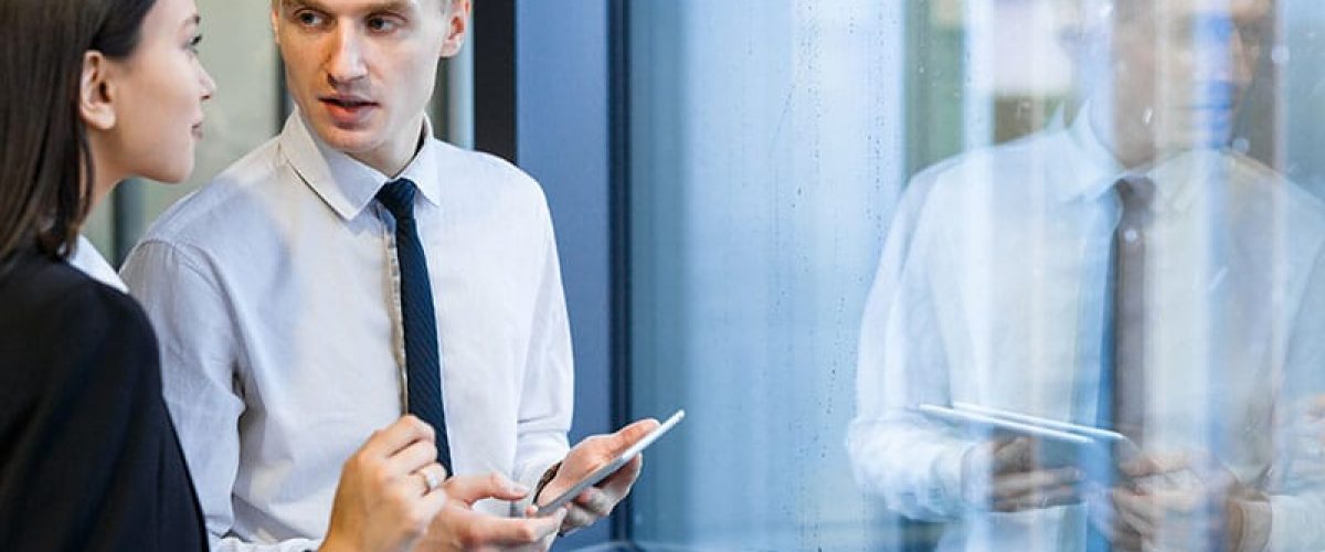 brokers-communicating-PE5MGVX-resize